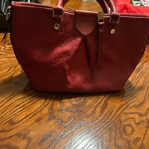Red Empreinte Mazarine Handbag